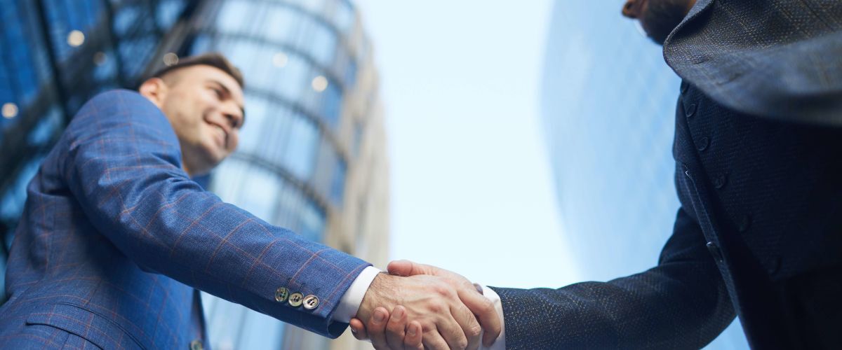 Business Partners Shaking Hands | Highest Paying Jobs in Malaysia